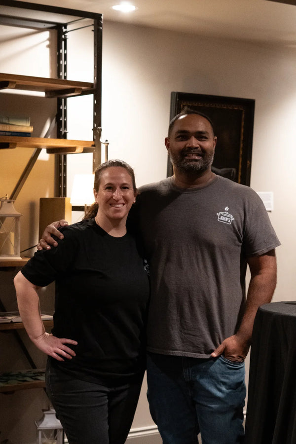 John's South Indian Kitchen catering team couple portrait indoors