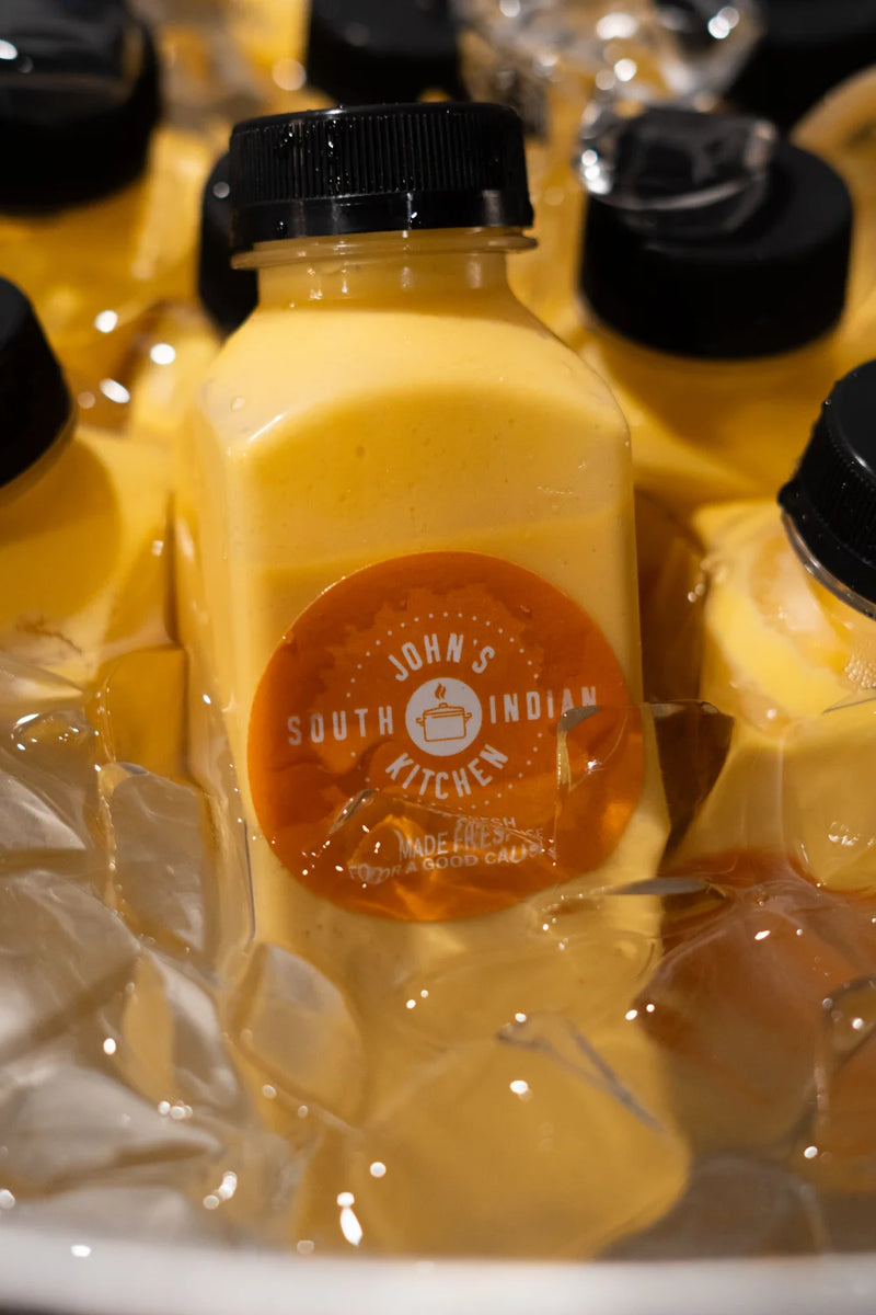 John's South Indian Kitchen mango lassi bottle label ice closeup
